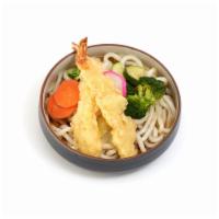 Shrimp Tempura Udon · Thick white noodles in fish broth soup with shrimp tempura.