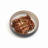 Side of Teriyaki Chicken · Side of our famous teriyaki chicken served with sauce &
green onions.