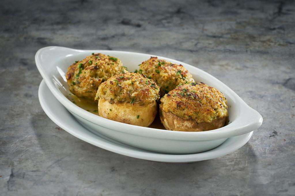 Mushrooms Stuffed with Crabmeat · Broiled and topped with romano cheese.