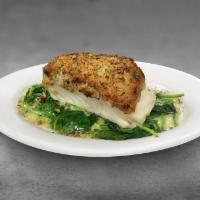 Garlic Crusted Sea Bass · tender fillet, topped with a panko garlic crust & lemon butter