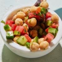 Side Chickpea Salad · Cooked chickpeas mixed with freshly chopped tomato, cucumber, onion, mint, parsley, and cila...
