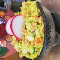 Guacamole Dip · Avocado with diced tomatoes, onion, cilantro, and lime juice.