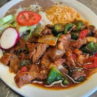 Steak Ranchero · Made with squash, bell peppers, onions, sauteed in your choice of mild or spicy sauce. Serve...