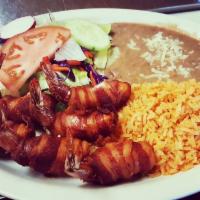 Camarones Costa Azul  · 6 bacon-wrapped shrimp stuffed with Queso Fresco. Served with rice, beans, and salad.
