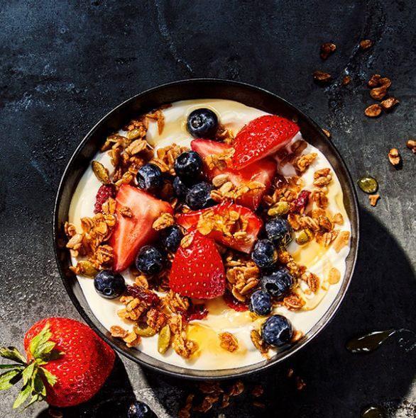 Greek Yogurt With Mixed Berries Parfait · 240 Cal. Greek yogurt with honey, maple butter pecan granola with whole grain oats, and fresh strawberries and blueberries. Allergens: Contains Milk, Tree Nuts. May contain Wheat, Soy