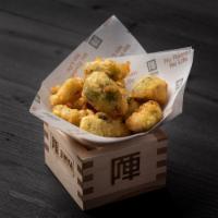 Brussels Sprouts Tempura · Crispy tempura Brussels sprouts with white truffle oil. Vegetarian.