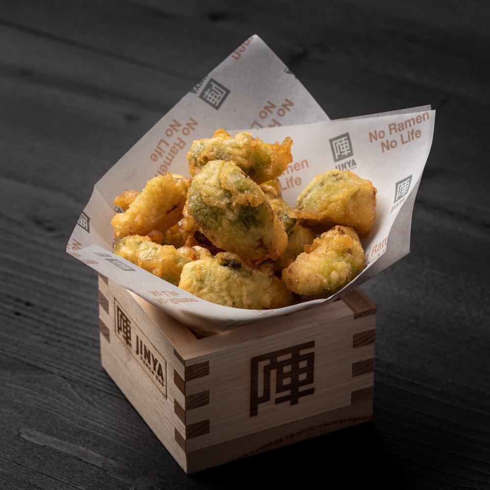 Brussels Sprouts Tempura · Crispy tempura Brussels sprouts with white truffle oil. Vegetarian.