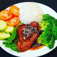 Roasted Soy Chicken with Rice · Coco garlic sauce soy chicken, broccoli, cucumber, and steam rice.
