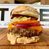 The Street Burger · Our Newest Burger! 6 ounces of (Chuck, Brisket, and Short Rib) Hand Cut Cheddar, Lettuce, To...
