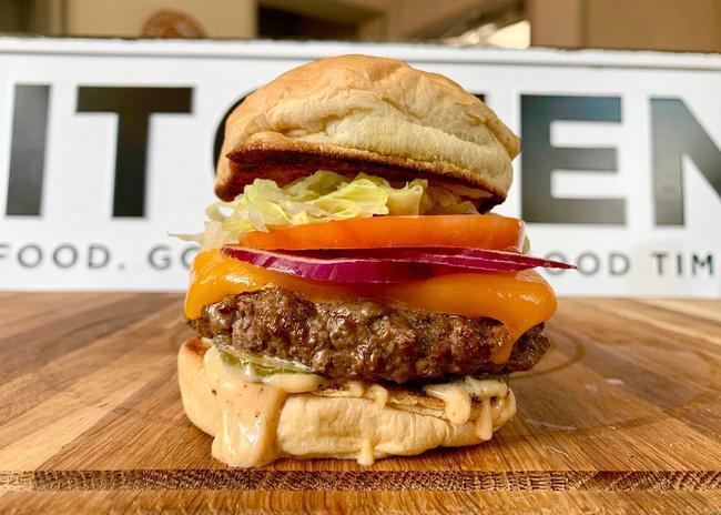 The Street Burger · Our Newest Burger! 6 ounces of (Chuck, Brisket, and Short Rib) Hand Cut Cheddar, Lettuce, Tomato, Onion, Pickle, and Garlic Mayo on a Potato Bun.