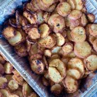 Garlic Potato Wedges · Sliced Red B Potatoes with garlic seasoning roasted to perfection.