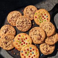 One Dozen Mixed Cookies · 12 freshly baked cookies, made with 6 Chocolate Chipper Cookies, 3 Candy Cookies, and 3 Oatm...
