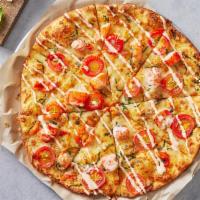 Lobster & Langostino Pizza · Maine and langostino lobster, mozzarella, fresh tomatoes and sweet basil. Drizzled with a lo...