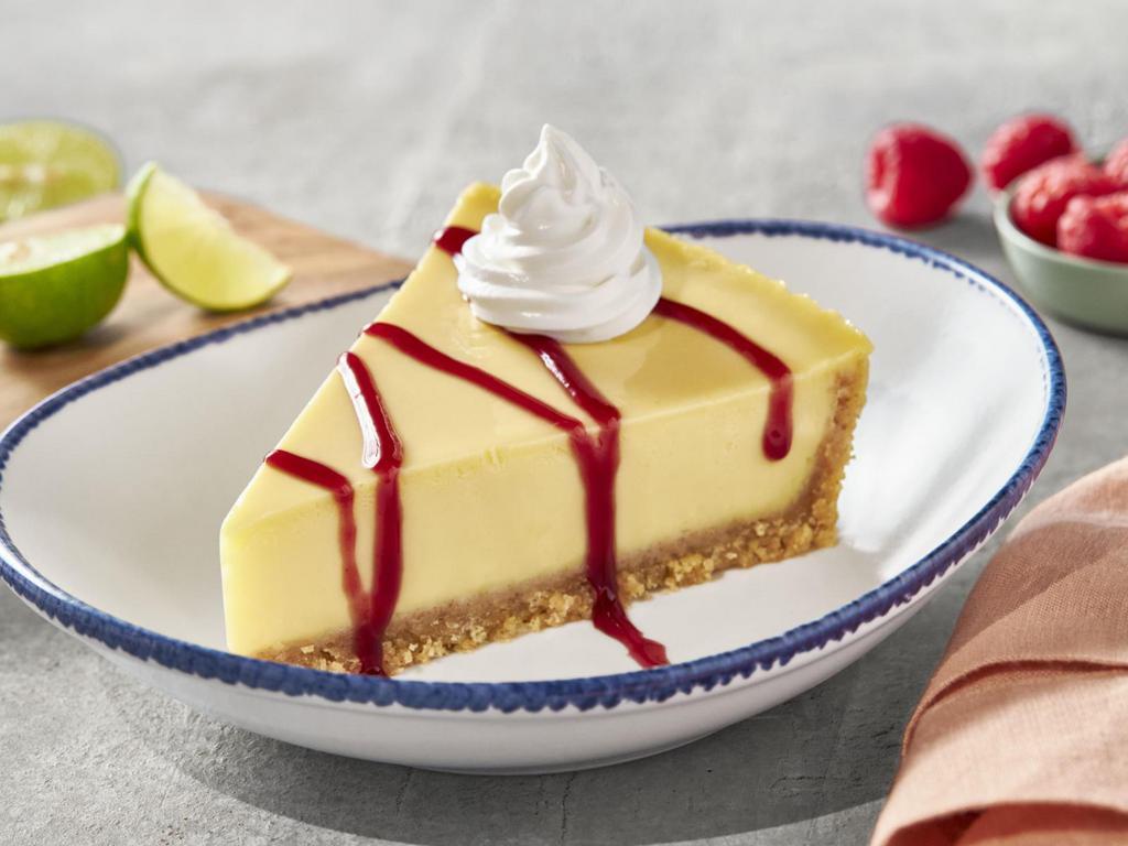 Key Lime Pie · A tart, sweet, creamy classic with a graham cracker crust. Drizzled with raspberry sauce.
750 Cal