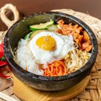 Lunch Spicy Pork Bibimbap · Steamed rice topped with Beansprouts, Carrots, Zucchini, Radish, Spicy Pork, Fried Egg