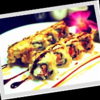 Dynamite Roll · Tempura roll of crab stick, cream cheese and assorted fish.
