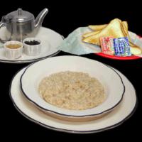 Oatmeal with Toast Breakfast · Served with milk, raisins and brown sugar and buttered toast with jelly.