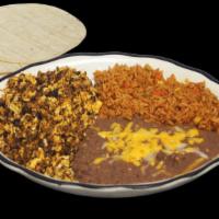 Chorizo Plate Breakfast · 3 eggs scrambled with chorizo, served with beans, rice and tortillas.