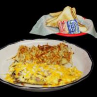 3 Meat & Cheese Omelette · Three egg omelette with ham, bacon, sausage and cheese. Served with hash browns and buttered...