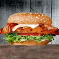Chicken Club Sandwich · Charbroiled chicken breast, bacon, Swiss cheese, mayonnaise, lettuce and tomato on a sesame ...