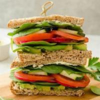Vegetarian Sandwich · Swiss cheese, avocado, mayonnaise, cucumber, lettuce, tomato and red onion on wheat bread. N...