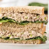 Albacore Tuna Sandwich · Prepared with mayonnaise, lettuce and tomato on white toast.