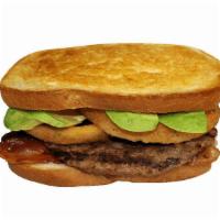 Sourdough Bacon Avocado Cheeseburger · ¼ lb. patty on sourdough with cheese, bacon, avocado, onion rings & 1000 Islands dressing.