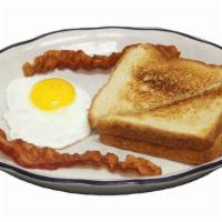  Kids 1 Egg  & Toast Breakfast · One egg cooked to order, two pieces of bacon or sausage and buttered toast with jelly.