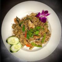 Basil Thai Fried Rice · Fried rice with eggs, chili, onions, bell peppers, tomatoes and basil. Medium spicy.