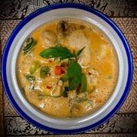 Panang Curry · Bell pepper, green bean in panang curry sauce garnished with lime leaf. Spicy.