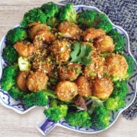 Garlic Shrimp and Scallops · Garlic sauteed with shrimp and scallops served with steam broccoli.