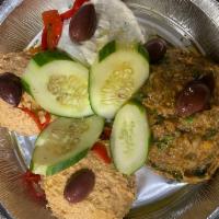 Cold Spreads · Hummus, eggplant dip spicy feta, tzatziki with pita.