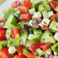 House Salad · Romaine lettuce, diced tomatoes, cucumbers, onions, feta (olive oil, vinegar, oregano).
