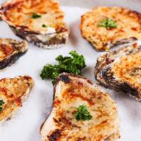 CHARGRILLED OYSTERS · Chargrilled blue point oysters with Perry's Signature Steak Butter, pepper jack cheese and P...