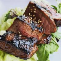 Short Ribs · 3 pieces. Grilled, marinated short ribs in a ganjang-based sauce.