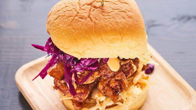 Buttermilk Fried Chicken Burger · Buttermilk fried chicken marinated in buttermilk with 11 herbs and spices, pickled red cabbage, coleslaw with homemade spicy mayo and house mayo sauce on a soft airy potato bun. (Dark meat)