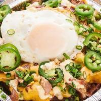 Loaded Kitchen Sink Fries · Cheese fries, roasted pulled pork, applewood smoked bacon, runny egg, scallions and jalapeno...