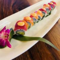 57. Paradise Roll · Whitefish, cucumber topped with salmon and tuna.
