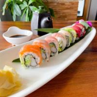 58. Rainbow Roll  · California inside topped with tuna, salmon whitefish, yellowtail, and avocado.