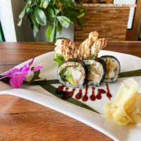 66. Spider Roll · Soft shell crab, avocado, and cucumber. Cooked.