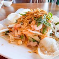 98. Goi Ngo Sen Tom Thit · Lotus root salad with shrimp and pork.