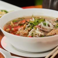 111. Pho Dac Biet · Special combo with eye round steak, well-done flank, fat brisket, soft tendon, and beef trip...
