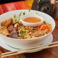  148. Bun Dac Biet  · House special rice vermicelli combination: egg rolls, shredded pork, charbroiled pork, and s...