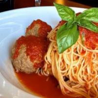 Capellini con Polpette · Angel hair pasta topped with marinara sauce and homemade meatballs.