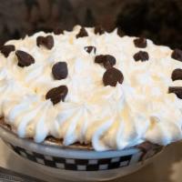 Chocolate Cream Pie · Rich chocolate cream in a chocolate cookie crust.  Topped with whipped cream.