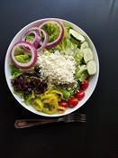 Greek Salad · Feta cheese, cucumber, tomato, onion, banana pepper, green pepper, Kalamata olives.