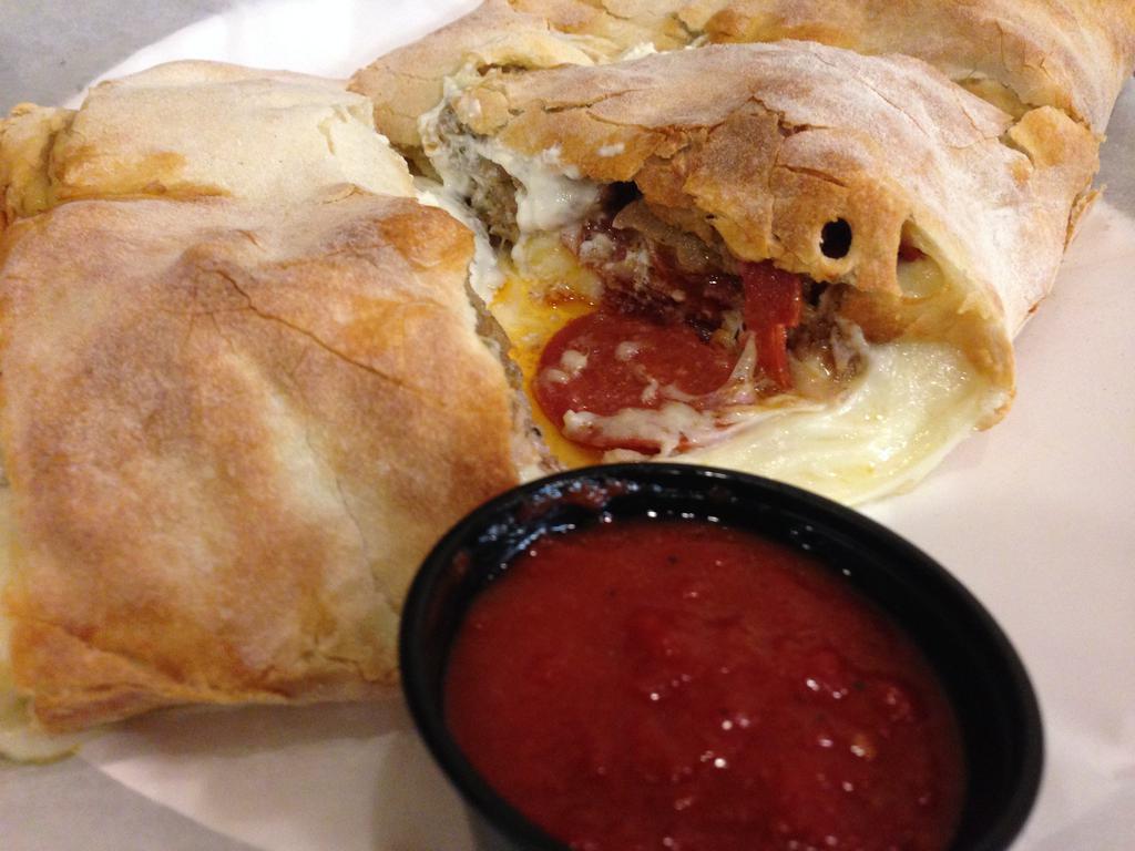 Traditional Stromboli · Comes with 2 marinara sides.