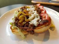 Steak and Cheese Sub · Cheese, lettuce, tomato, onions, banana peppers, mayo, oil and vinegar, salt, and pepper.