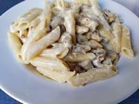 Alfredo Dinner · Pasta folded into a creamy Parmesan-garlic sauce.