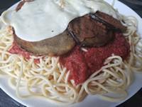Eggplant Parmesan Dinner · Lightly breaded, covered with mozzarella, and marinara sauce served on a bed of spaghetti.